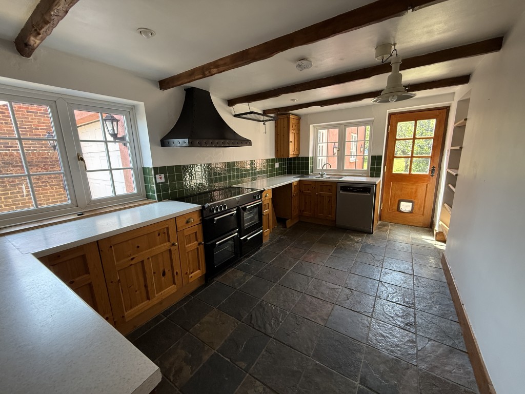 Lot: 168 - DETACHED COTTAGE IN ESSEX VILLAGE LOCATION - Fitted kitchen with dual aspect windows and door to garden